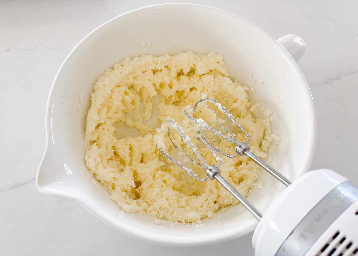 Mixing cookie dough in a bowl.