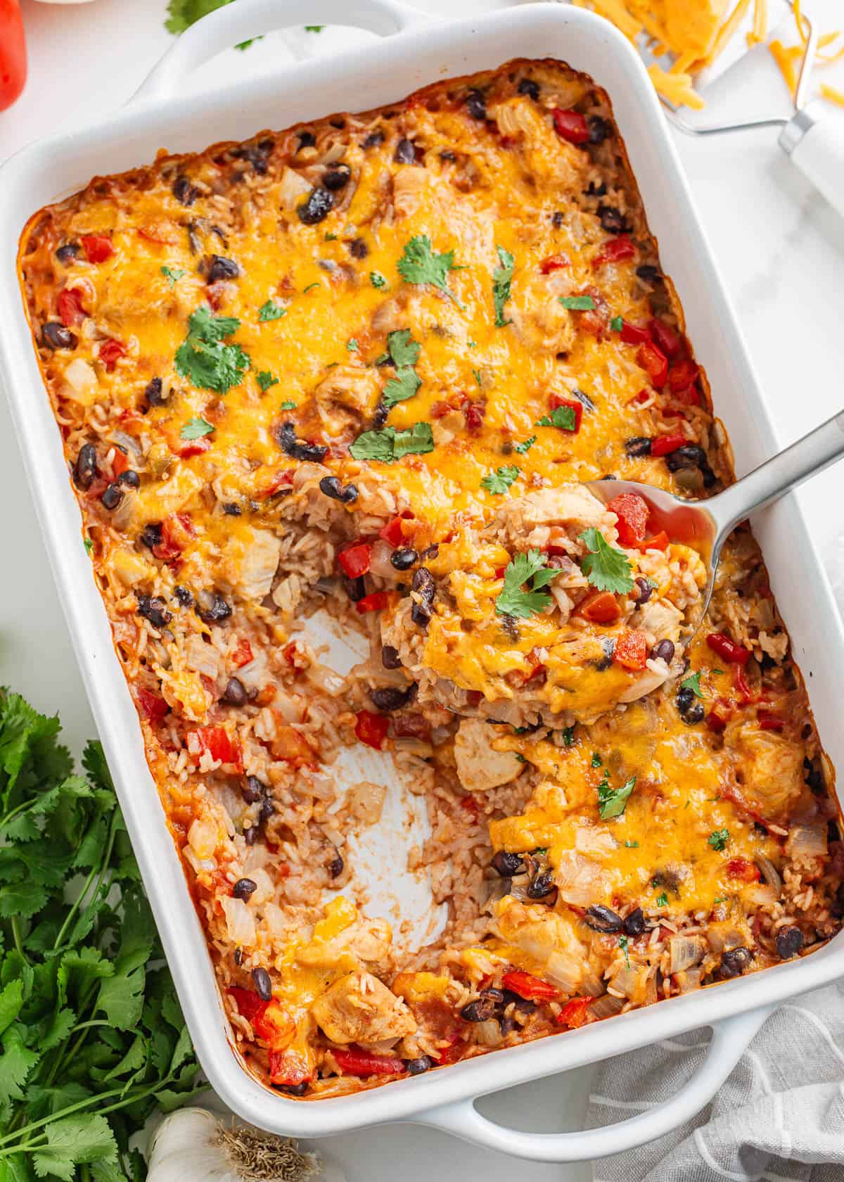 Overhead photo of Mexican chicken and rice bake in a casserole dish.