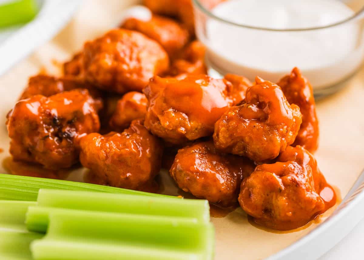 Boneless chicken wings with celery. 