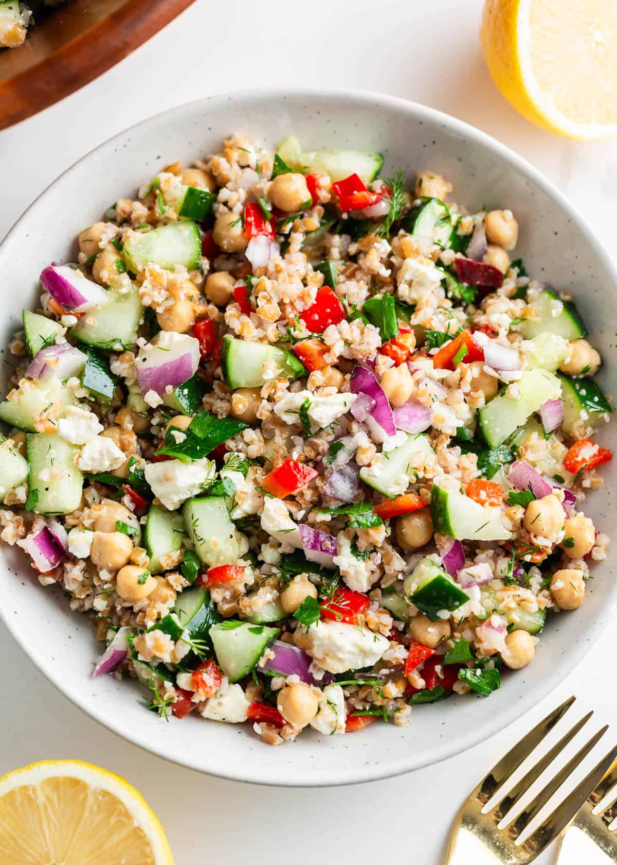 Bulgur salad in a white bowl.