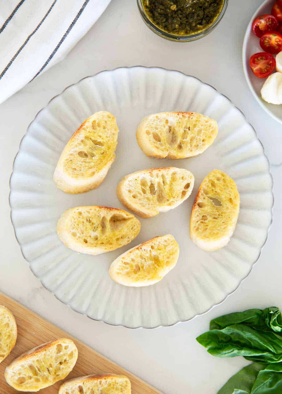 Showing how to make crostini.