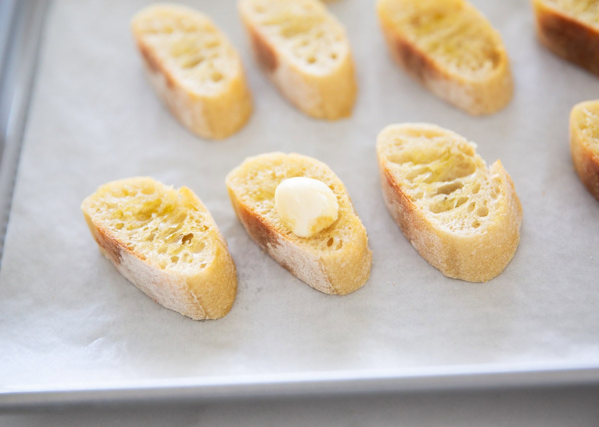 Showing how to make crostini.