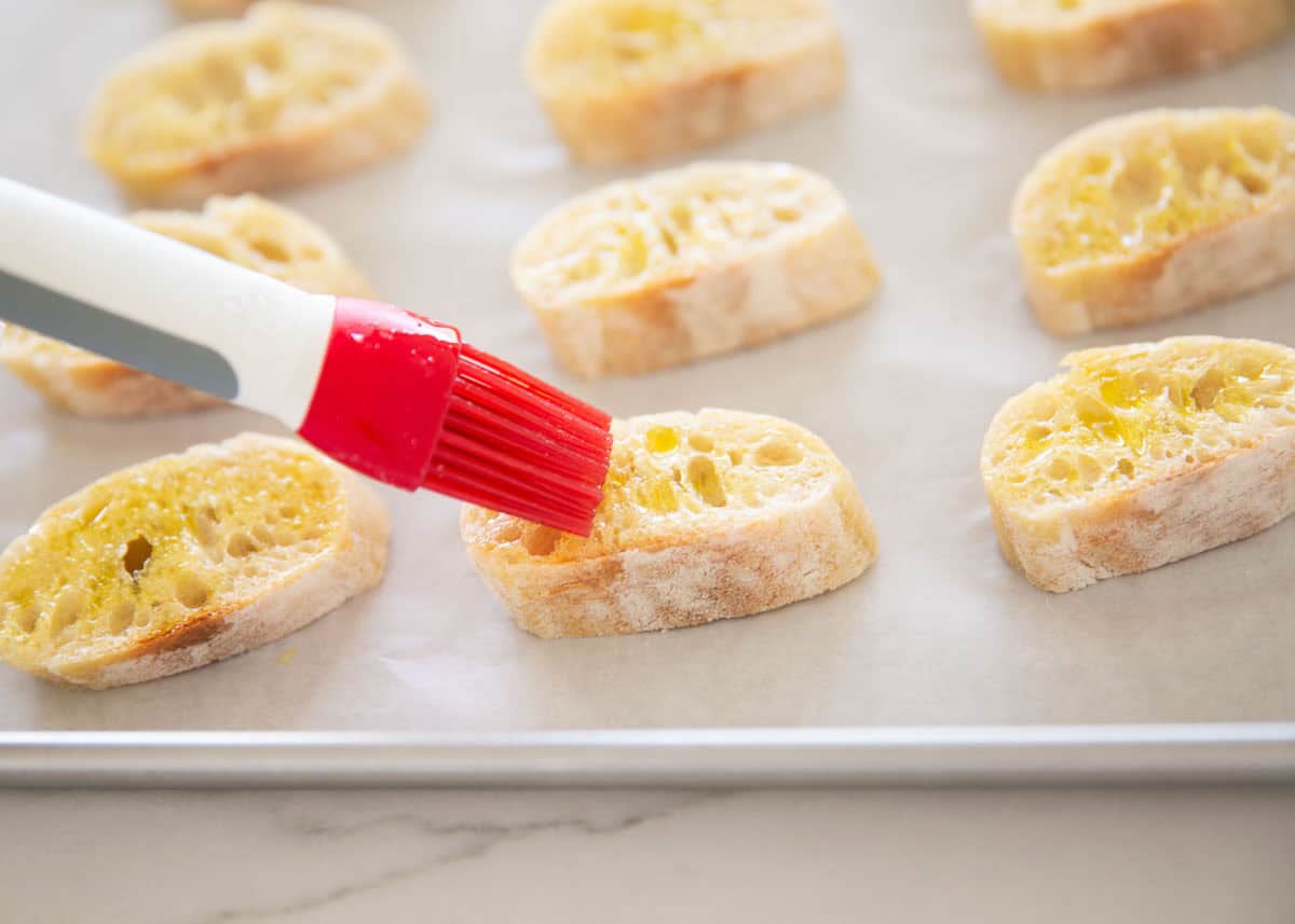 Showing how to make crostini.