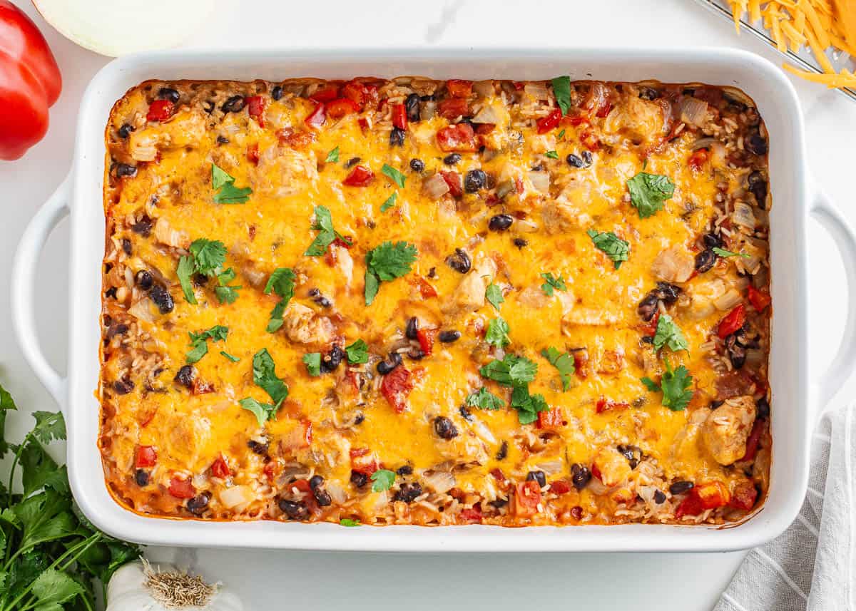 Baked Mexican chicken and rice in a casserole dish.