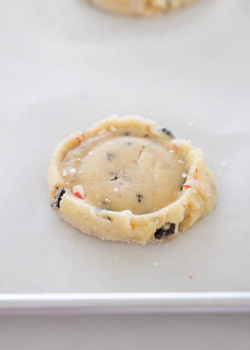 Showing how to make peppermint sugar cookies.