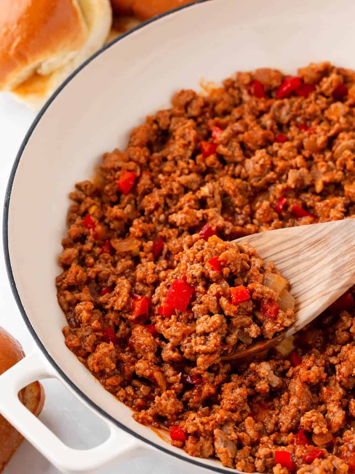 A skillet with ground turkey sloppy joe mixture.