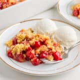 Cherry dump cake on a plate.