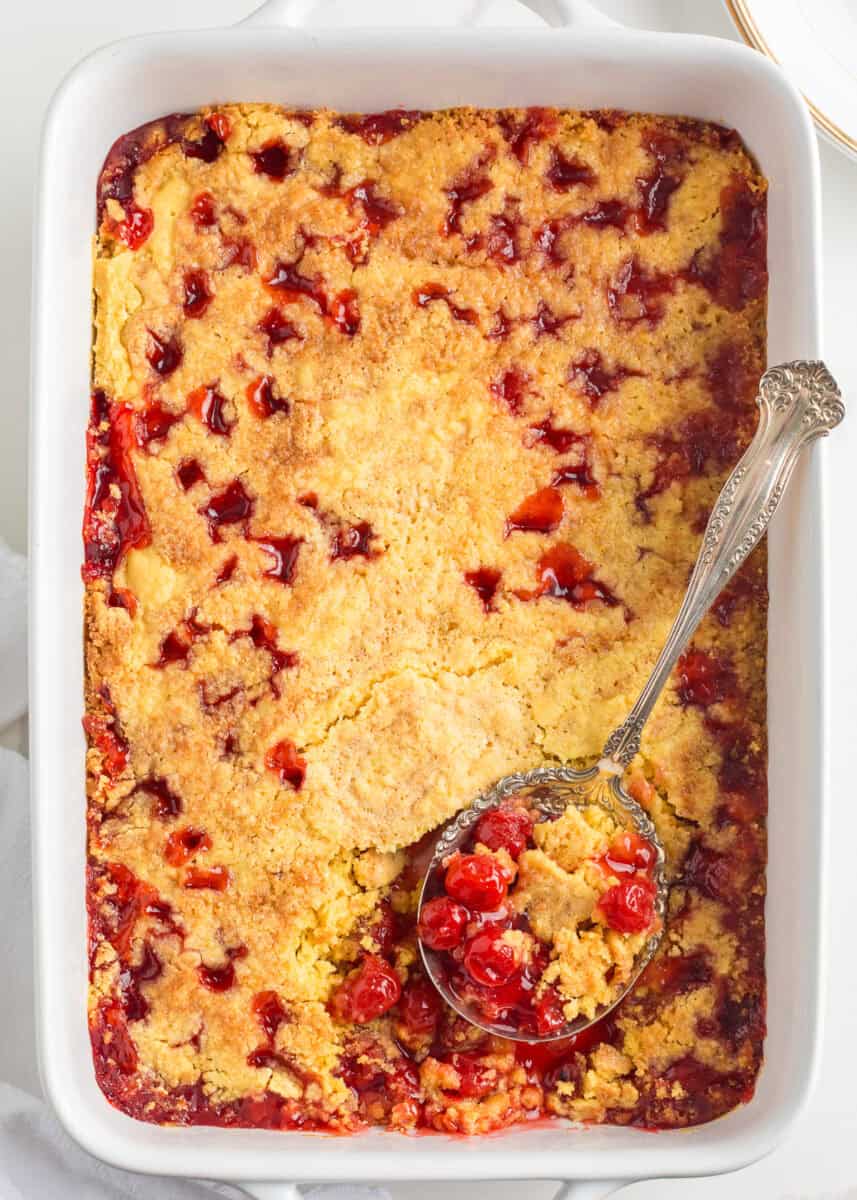 Cherry dump bake in a baking dish.