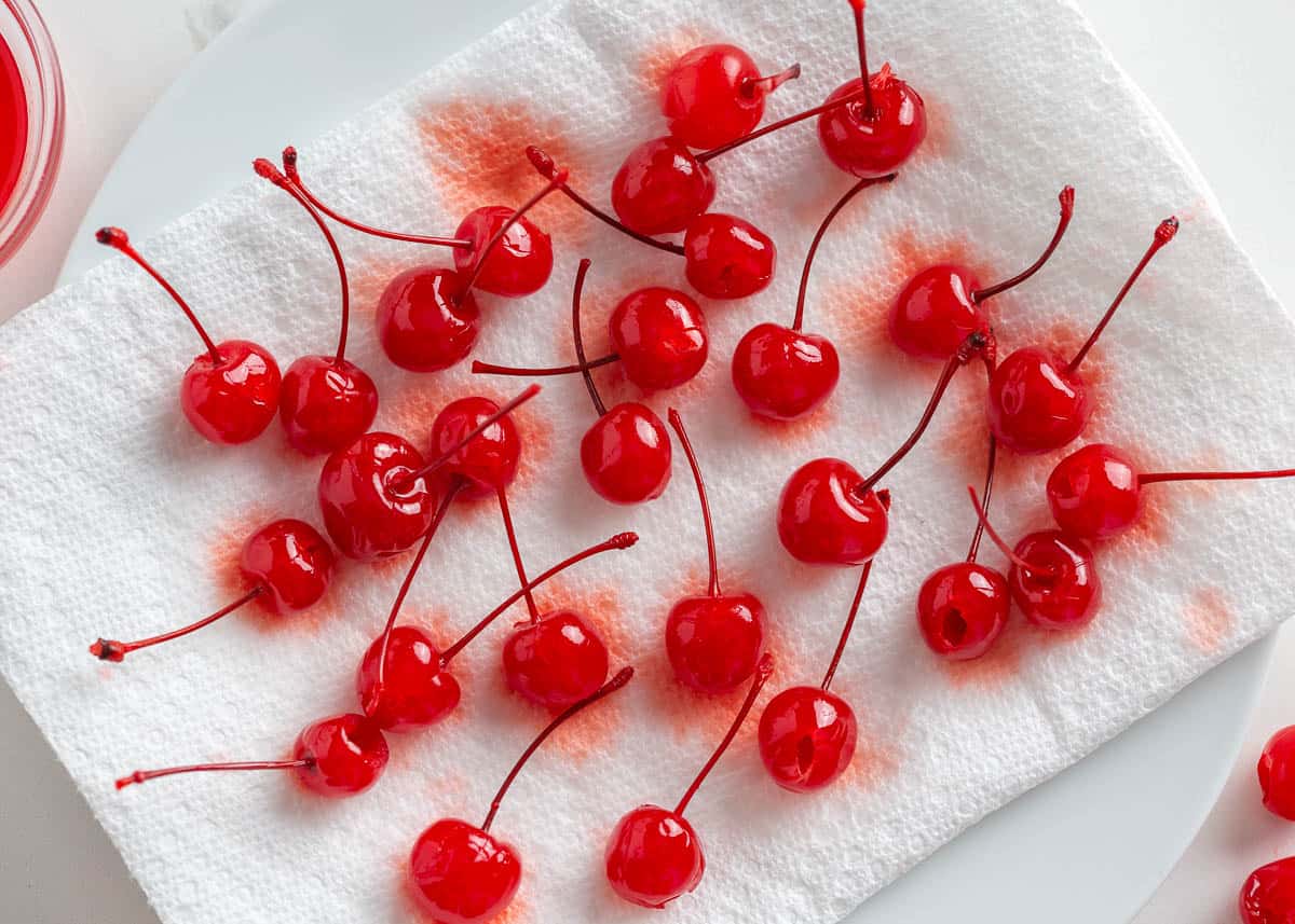 Cherries on a paper towel.