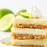 Stacked key lime pie bars.