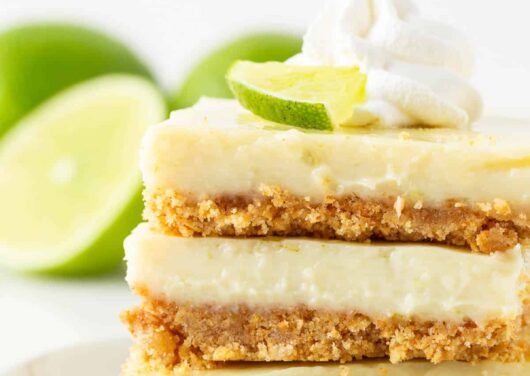 Stacked key lime pie bars.