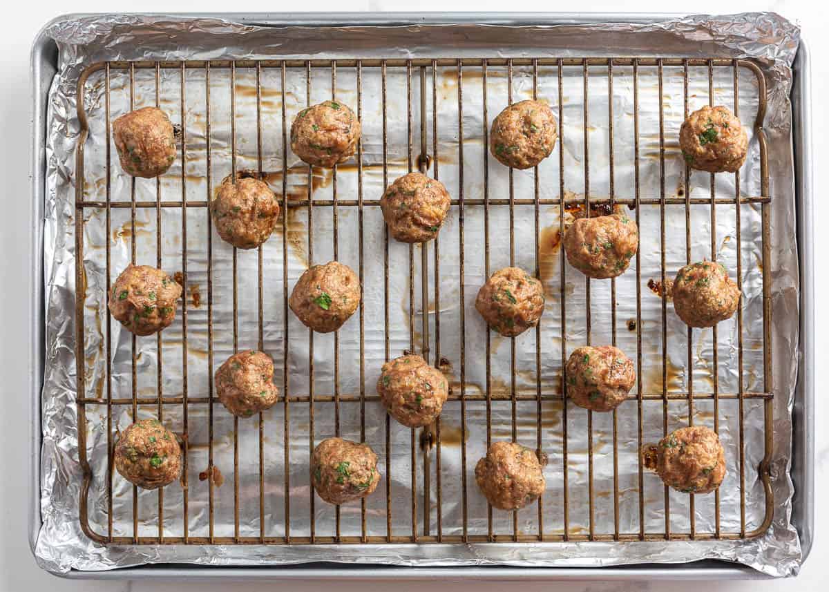 Showing how to make turkey meatballs.