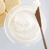 Sugar cookie frosting in a glass bowl.