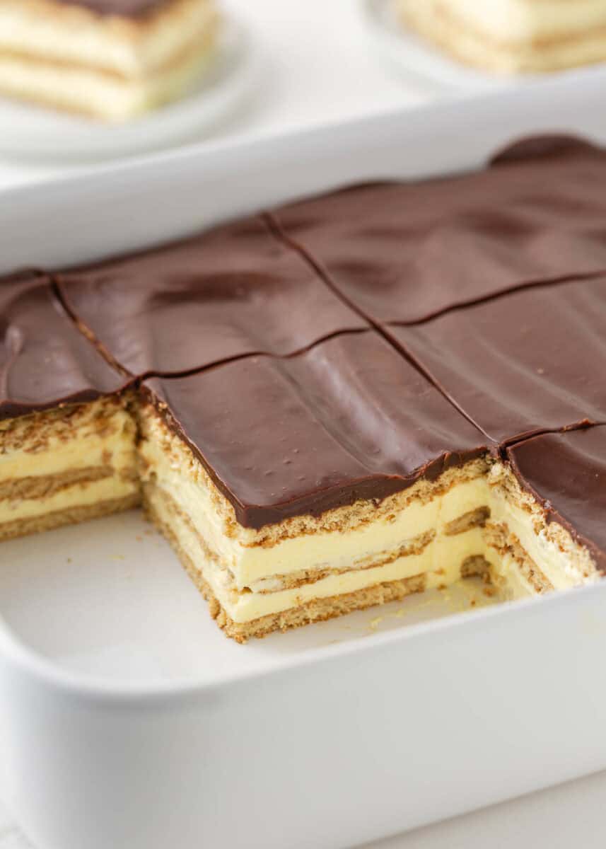 Eclair cake in a white baking dish.