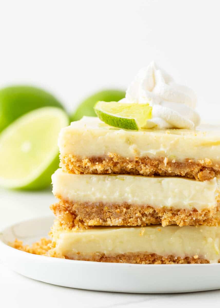 Stacked key lime pie bars.