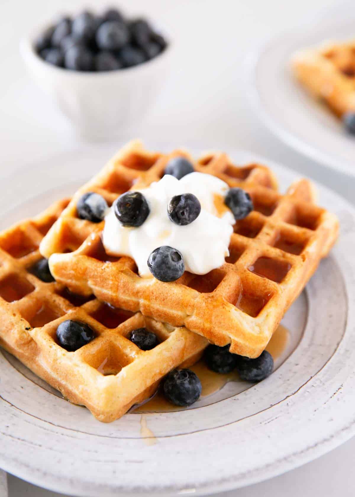 Sourdough waffles on plate.